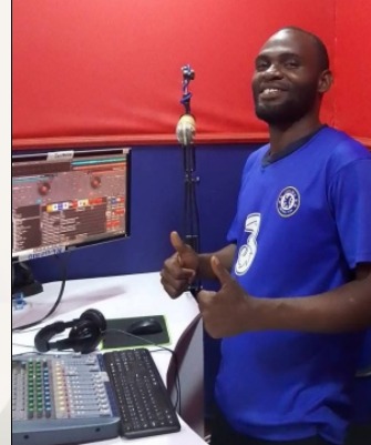 Presenter at the JAC FM broadcast desk